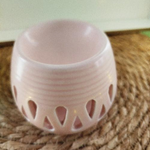 Brûleur Rose en Céramique avec Motifs Gouttes, élégant et pratique pour diffuser des parfums.