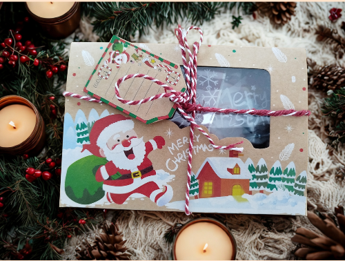 Box de 10 fondants parfumés de Noël artisanaux, senteurs gourmandes et hivernales, en cire naturelle et fabrication française.