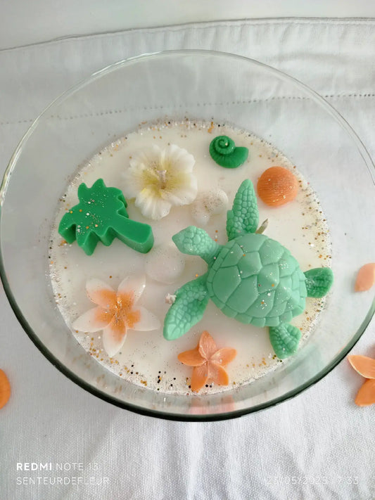 Centre de table tropical en cire avec éléments marins décoratifs
